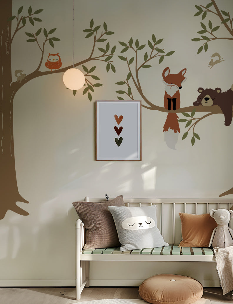 A wall decal featuring a bear, fox, owl, and squirrels in a woodland setting | www.pinknbluebaby.com